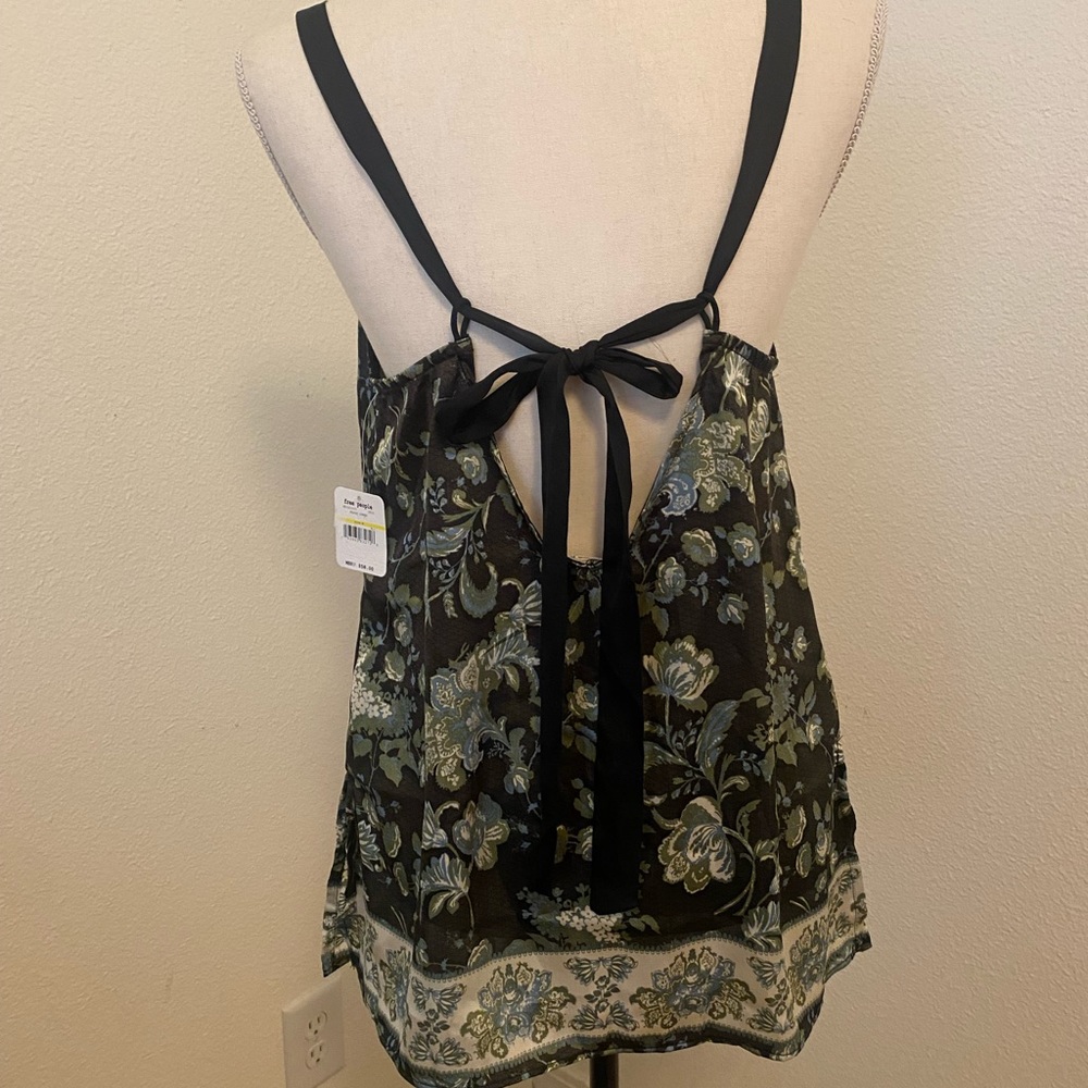 Cute free people silk tank. New with tags. Black with greens and blues.